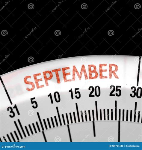 Close Up View of September Month with Weekly Number Calendar Wheel on ...