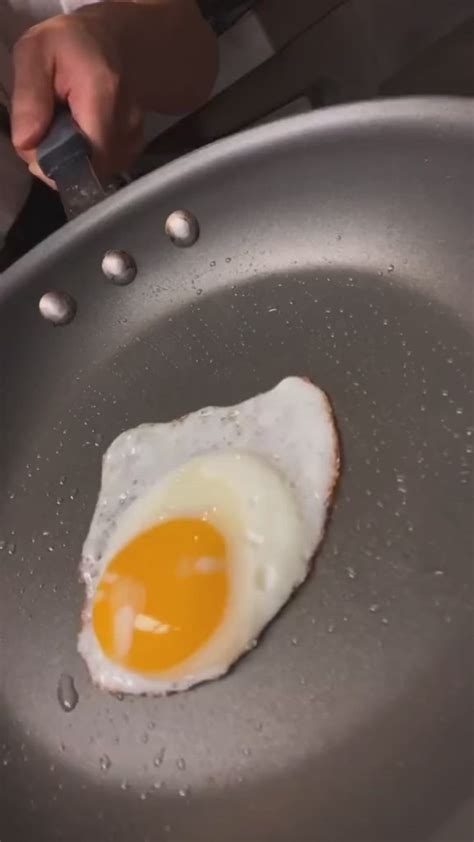 Fried eggs cooked over medium so they have just a slightly runny yolk ...