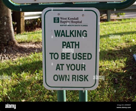 Miami, Florida, United States - December 29, 2023: Warning sign in ...