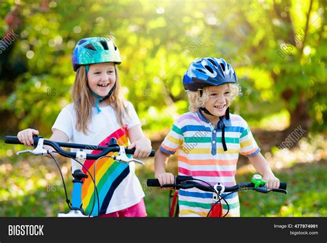 Kids On Bike. Children Image & Photo (Free Trial) | Bigstock