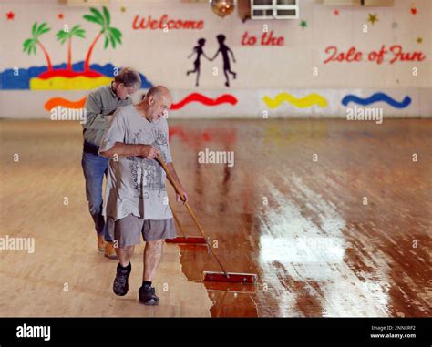 In this 2017 photo, Mike Stroyek and Doug Eno with Hart Floors, Inc ...