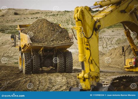 Image result for Large Excavators Loading Trucks