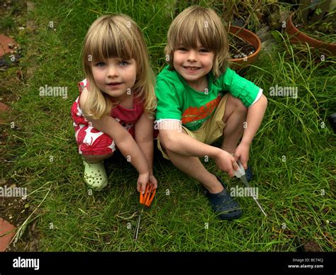 Brother and Sister 5 and 3 in a Birmingham Garden Stock Photo - Alamy