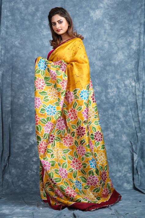 Mustard Yellow Pure Silk Saree with Multicolor Floral Design – Charukriti