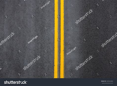 Yellow Double Solid Line Road Markings Stock Photo (Edit Now) 583842880