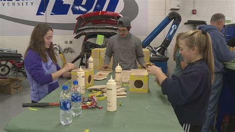 Volunteers make toys for holiday season at WU Tech