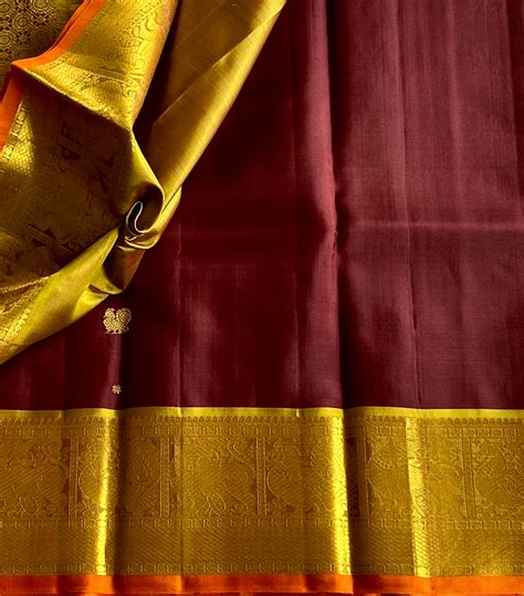 Golden Brocade Silk Saree with Maroon Pallu and Peacock Border – NAVARASAM