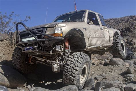 1999 Ford Ranger with coilovers, 1-ton axles, and 42s