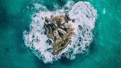 Download wallpaper 2560x1440 island, ocean, rocks, surf widescreen 16:9 ...