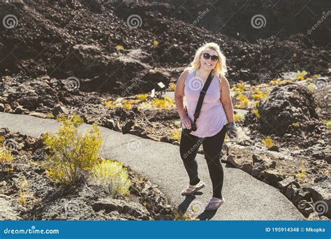 Blonde Woman Hiker Along the Trail in Lava Lands - Newberry Crater ...