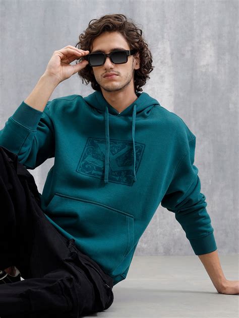 Oversized Brushed Fleece Hoodie With Tonal Flock Print | Teal – Wrogn