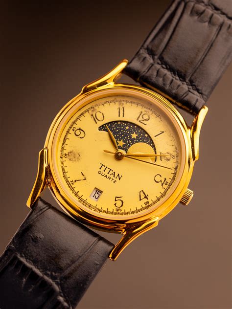 Titan Large Moonphase (Ref. 185YAB) (31mm; Quartz) – The Revolver Club