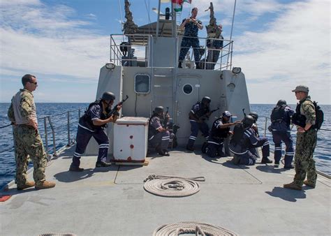 Boarding team members from Mauritius set a perimeter - NARA & DVIDS ...