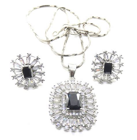 Jewelshingar Jewellery American Diamond Silver Plated Green Colour Stud ...