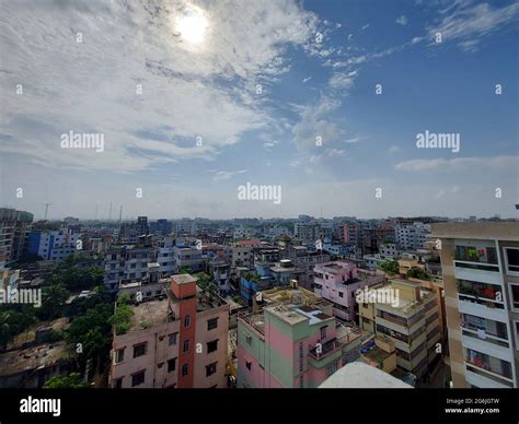 Bangladesh capital Dhaka city landscape on a sunny morning. Blue sky ...
