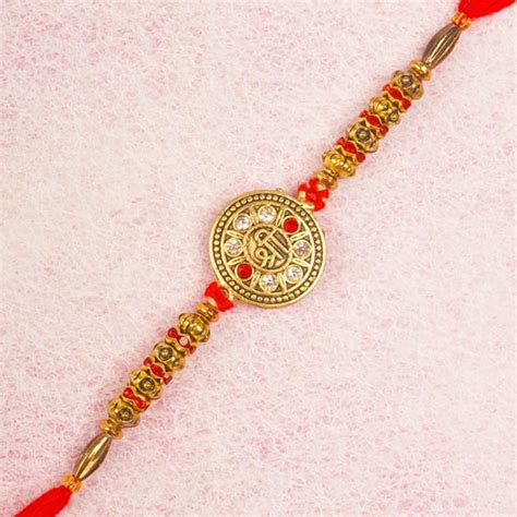 Send Ethnic Shree Round Pendant Rakhi Online