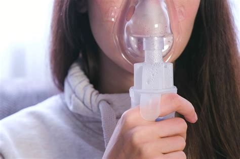 Image result for Using Inhaler and Mask