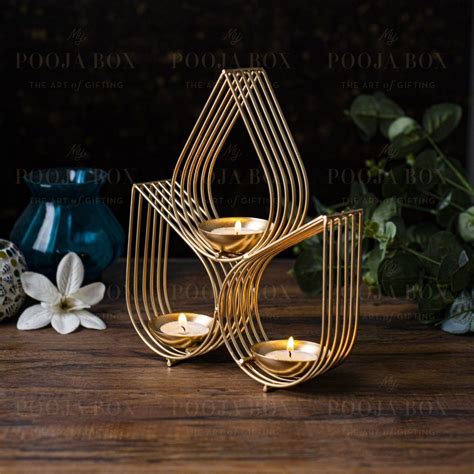 Buy Ella Wall Decor Diya Holder (Set of 2) Online in India - Mypoojabox.in