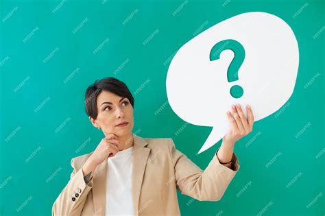 Premium Photo | Medium shot woman posing with question mark