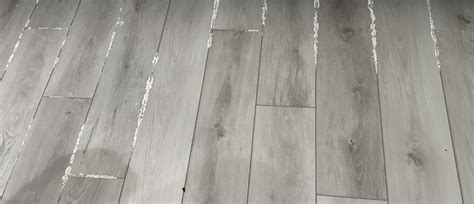 New LVP has white substance coming through seams : r/Flooring