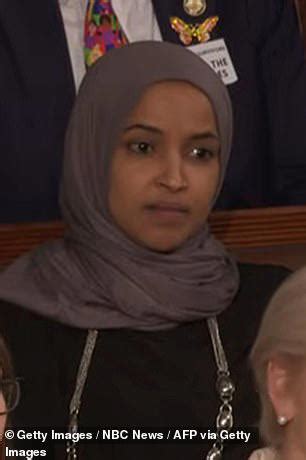 Ilhan Omar looks ready to cry as her heckling is drowned out by chants ...