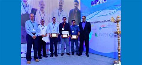 B.G. Jayaram (extreme left) and Raj Kalady (extreme right) with long ...