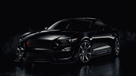 Sleek Black Ford Mustang Muscle Car HD Wallpaper