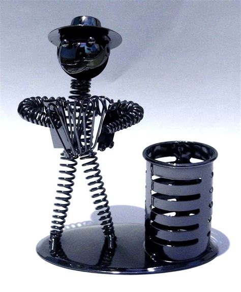 Iron Pen Stand and Spring Musician Figure Table Top Showpiece : Amazon ...