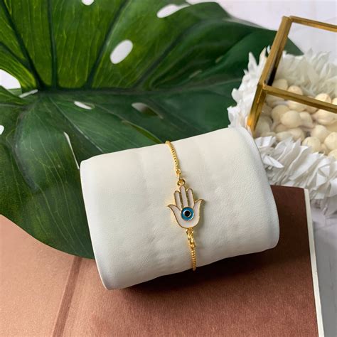 Etnico I Jewels Rakshabandhan Hamsa Shape Enamel Evil Eye lumba Rakhi ...