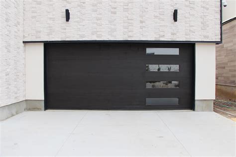 Modern Black Garage Door for Contemporary Rockwood Design