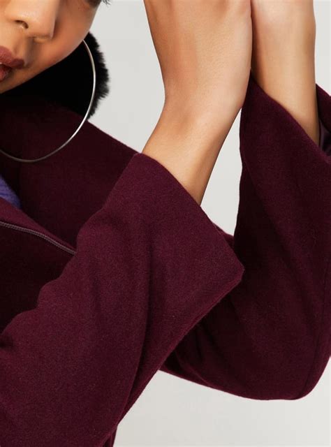 Buy Women Faux Fur Trimmed Hooded Coat Online at just Rs. 3499.0 ...