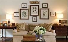 Living Room Pictures For The Walls by Gracious Groupings Tips For Decorating Halls And Walls Living Room Pictures For The Walls