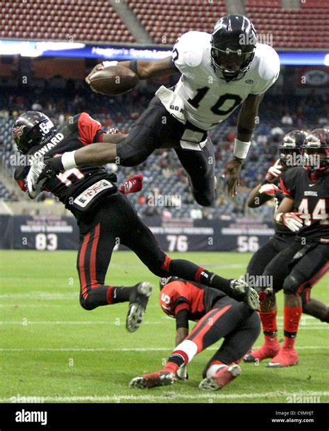 Cibolo Steele High School quarterback Tommy Armstrong jumps over Port ...