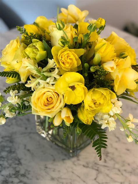 Yellow floral arrangement by Stem Floral Design | Yellow flower ...