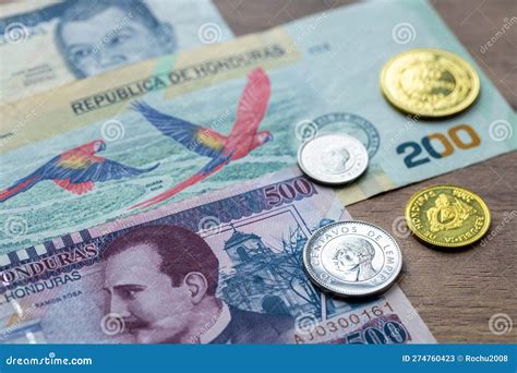 Currency Of Honduras, A Rolled-up 200 Lempira Banknote With Macaw ...