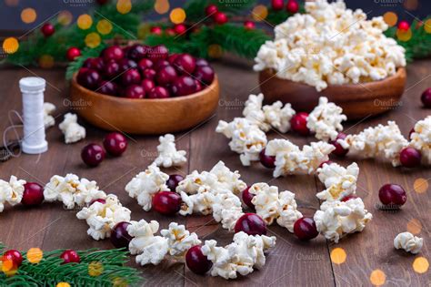 Traditional handcrafted Christmas popcorn garland with red cranberries ...