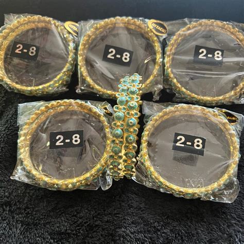 12 - Gold/Green bangles/churia Size 2x8 Brand new... - Depop