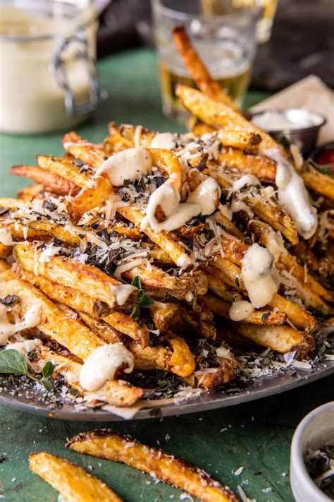 Garlic Parmesan French Fries Dressed in Caesar Dressing. - Half Baked ...