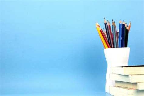 School accessories and education elements, books and alarm clock on ...