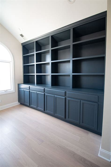 Painting DIY Built-Ins Dark Blue | The DIY Playbook | Home library design, Office built ins ...