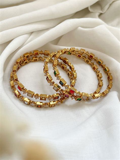 Buy Matte Finish Navarathna Block Stone Set Of 4 Bangles Online - Ishhaara