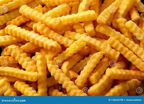 Close Up Background of Crinkle Cut Fried Chips Stock Photo - Image of ...