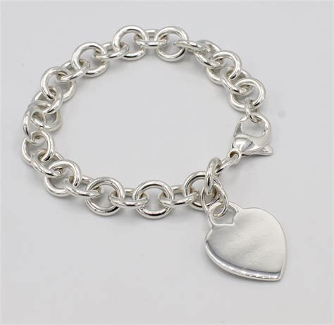 Tiffany and Co. Sterling Silver Chain Link Heart Charm Bracelet at 1stDibs