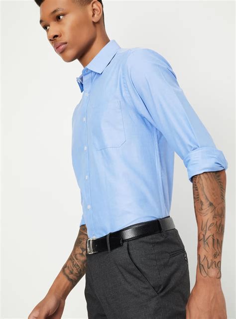 Buy Men Solid Slim Fit Formal Shirt Online at just Rs. 699.0 ...