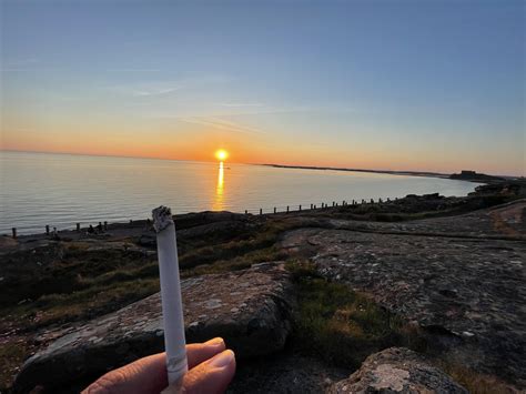 A few nights ago enjoying the sunset while smoking a couple Davidoff ...