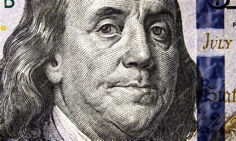 Premium Photo | Macro view of 100 us dollar bill benjamin franklin portrait