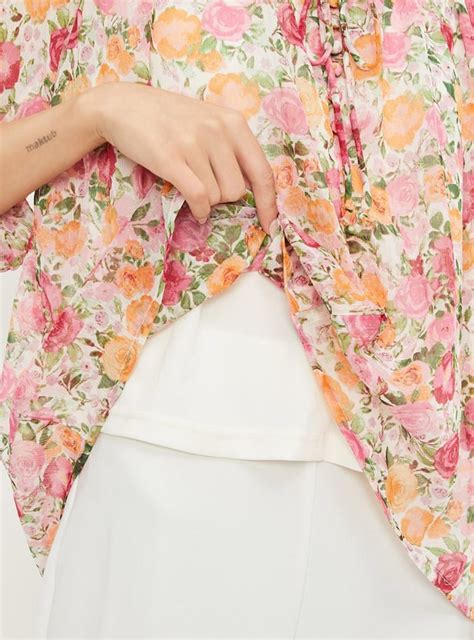 Buy Women Printed Tie-Up Neck Top Online at just Rs. 799.0 ...