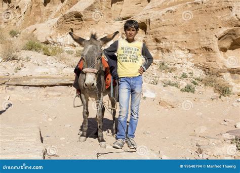 PETRA - JORDAN December 25th 2015: Arab Boy with His Donkey Editorial ...