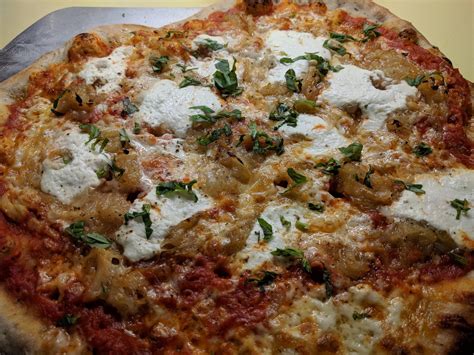 Caramelized Onion, Crushed Roasted Garlic, Ricotta, and Basil on Herb ...