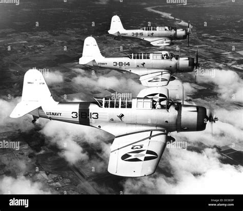 1940s THREE WORLD WAR II US NAVY DIVE BOMBERS FLYING IN FORMATION Stock ...